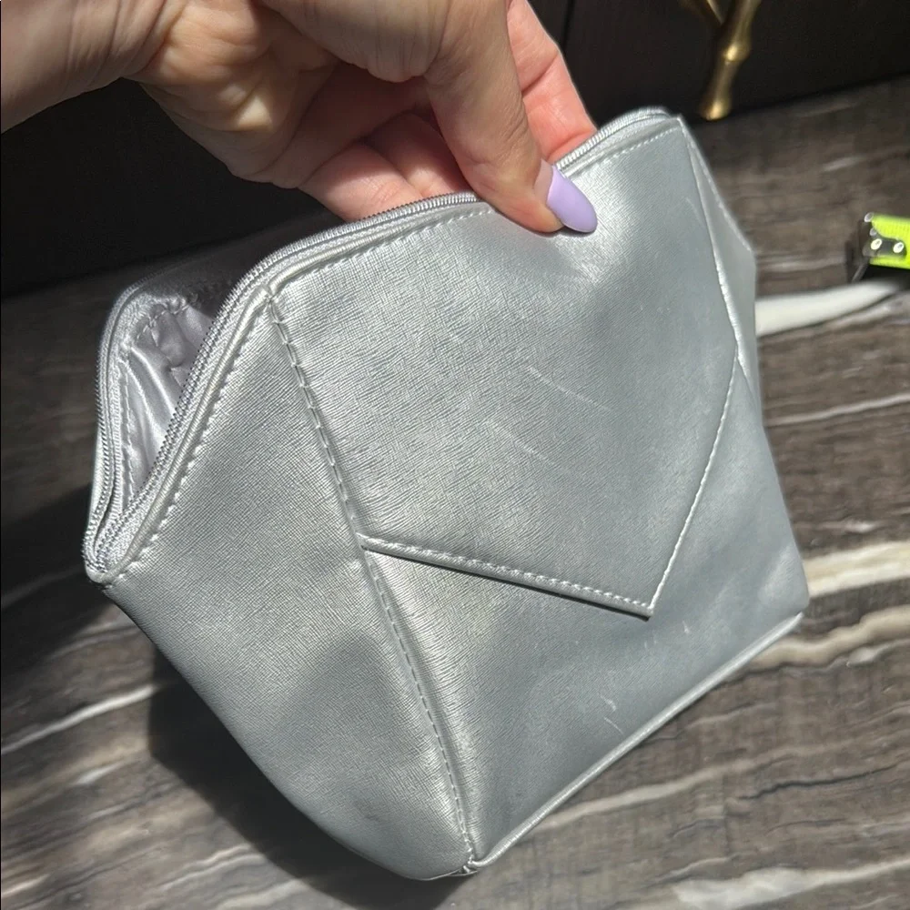 La Prairie Silver Cosmetic Bag with Geometric Design